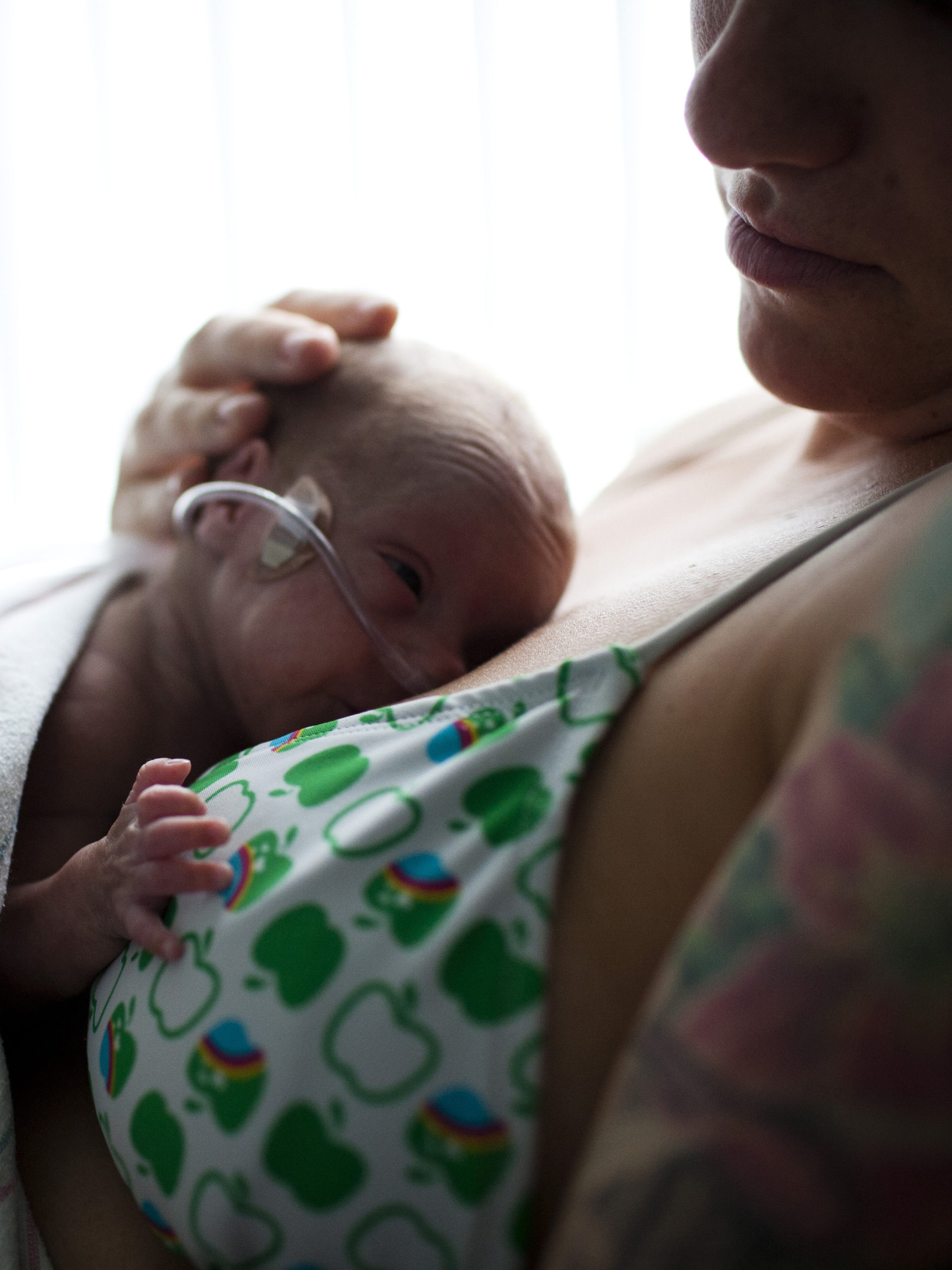 mom and preemie baby in NICU having skin-to-skin time